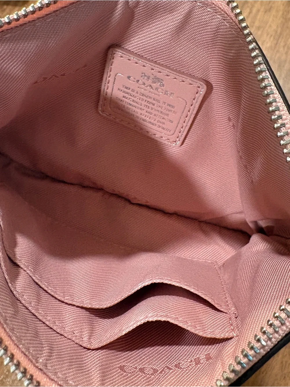 Coach Pebbled Leather Wristlet in pink